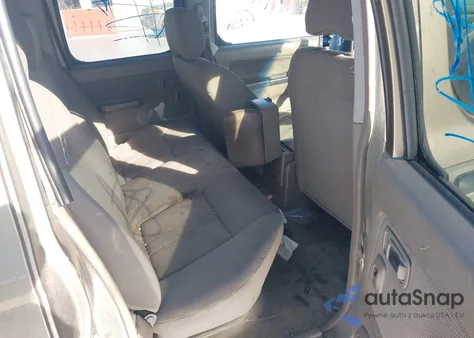 2003 Nissan Frontier Xe-V6 z USA, uszkodzony, nr VIN 1N6ED29Y03C426589